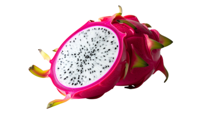 Cut pink dragon fruit with white pulp and black seeds on black