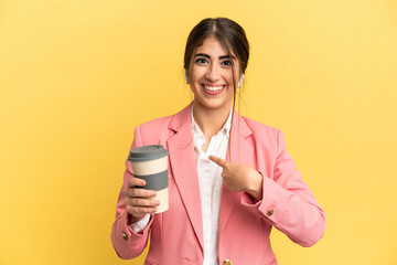 Business caucasian woman isolated on yellow background with surprise facial expression