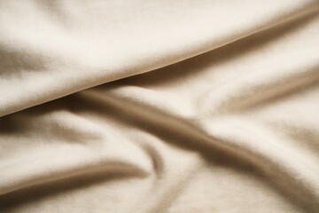 Fototapeta premium Soft beige fabric with natural folds and gentle light shadows creating a textured background for creative design and textile concepts. Ai generative