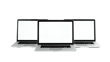 Three laptops, arranged in a row with blank screens, against a stark black background