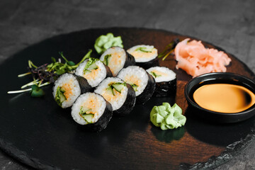 Sushi roll assortment with dipping sauce top view