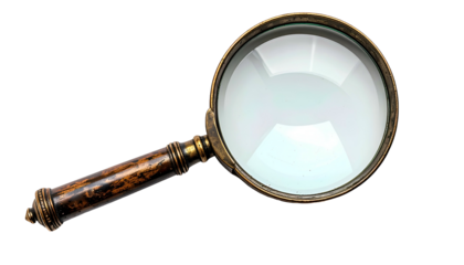 Antique magnifier with aged wood & brass on a black background