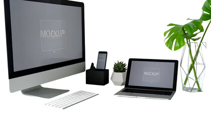 Workspace with computer, laptop, phone, plant, keyboard, and desktop background mockup