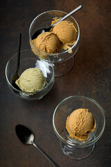 various ice cream in glass bowls