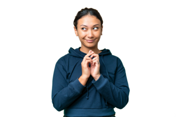 Young Uruguayan woman over isolated chroma key background scheming something