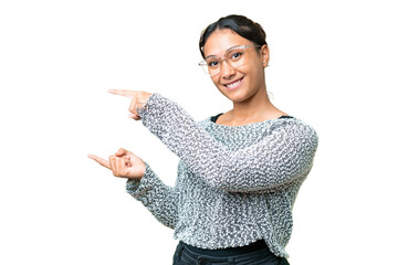 Young Uruguayan woman over isolated chroma key background pointing finger to the side and presenting a product