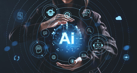 Futuristic AI technology concept with digital hologram interface and virtual assistant icons surrounding hands of businesswoman on dark background.