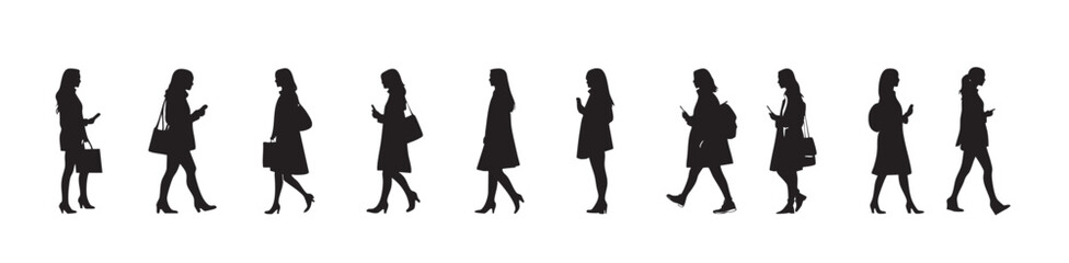 Silhouettes of Women Walking with Smartphones