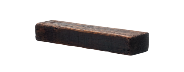 Dark, rectangular piece of weathered wood isolated on black