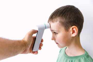 Infrared Thermometer Measuring Childs Temperature Medical Check Concept