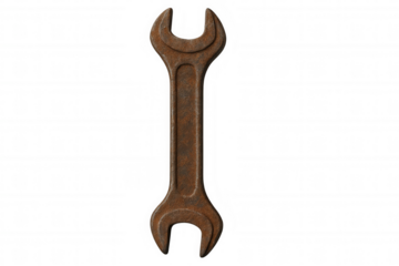 Rusty double open ended wrench symbolizing repair, old tools, maintenance and vintage industrial equipment, isolated