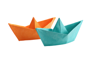 Two colorful paper boats, one orange, one teal, positioned slightly overlapping, against a black background