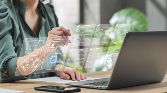 woman at computer getting drone license online,passing test examination,female pilot gets flight permission on internet website