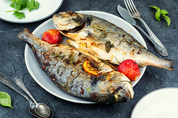 Grilled dorado fish with plums.