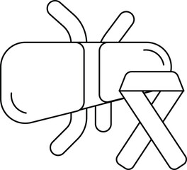 A bug is sitting on a ribbon that says 