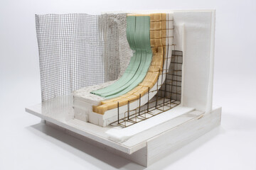 Cooktop – Cutaway 3D illustration of an energy-efficient induction cooktop with coil, sensor layer, and safety insulation.
