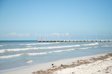 El Cuyo, Mexico; November 1, 2025: Footbridge leading to the sea in a Yucatan fishing village.