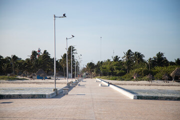 El Cuyo, Mexico; November 1, 2025: Footbridge leading to the sea in a Yucatan fishing village.