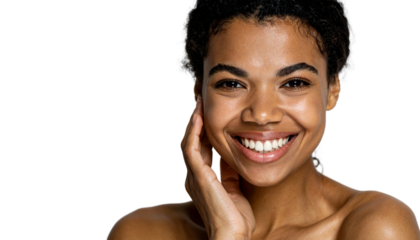 Joyful woman with natural smile touching her face against black background