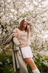 he photograph shows a girl wearing a light sweater 7271.