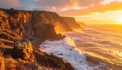 Fototapeta premium Golden Hour Sunset Over Rugged Coastal Cliffs With Crashing Waves And Sparkling Ocean Water