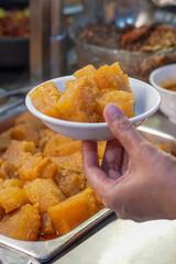 Close-up of sambal goreng krecek, a traditional Indonesian spicy dish made from crispy cow skin cooked with chili sauce