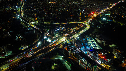 Drone shot of silk board junction interchange road & silk board metro line in bangalore, India