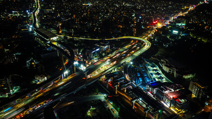 Drone shot of silk board junction interchange road & silk board metro line in bangalore, India