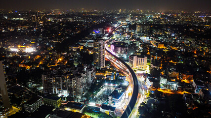 Night time Drone shot of Banerghatta road & metro line in bangalore, India © Sumit