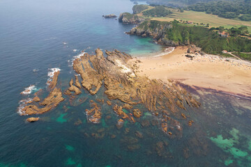 View of Amio Beach on sunny day. Pechon, Spain.