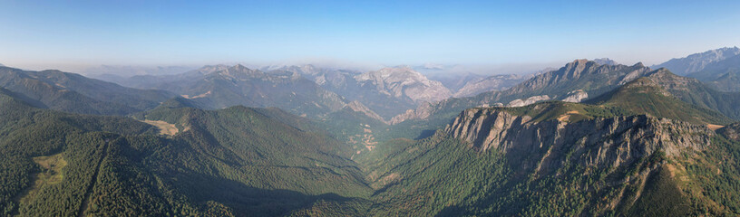 Panoramic aerial view of western part of Picos de Europa on sunny summer day. Asturias - Castile and Leon, Spain.