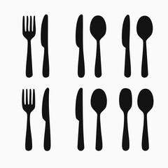 Elegant flat style silhouette of a fork knife and spoon set perfect for restaurant menus and culinary branding