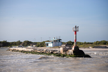 El Cuyo, Mexico; November 1, 2025: Entrance to the sea of ​​the port of a fishing village in Yucatan.