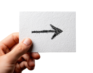 A hand holds a small white card with a hand-drawn arrow pointing right (1)