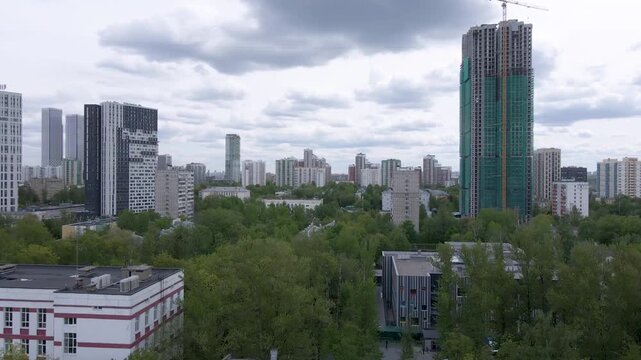 Russia Moscow. A modern microdistrict on the outskirts of Moscow, the capital of Russia, from a bird's eye view. Panoramic top view of modern apartment buildings, highways, streets and squares.
