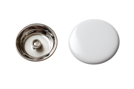 Two circular components, one metallic, one white.  Metallic inner cap, white outer button