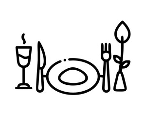 Elegant table setting with wine glass, plate, cutlery, and flower