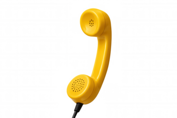 Yellow retro telephone receiver with cord, vintage communication concept, handset for making conversation