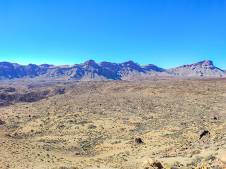 A Stunning Desert Landscape featuring Majestic Rocky Mountains, a sight to behold in nature