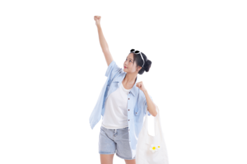 Joyful Excursion: A young woman celebrates her journey with a raised fist, holding a shopping bag. she is full of youthful energy and a sense of adventure.