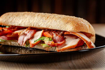 Club sandwich with smoked meat and vegetables