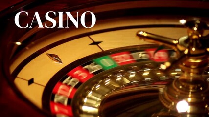 Spectacular animated banner, dynamic background with white CASINO lettering against a rotating roulette wheel in a luxury casino style.