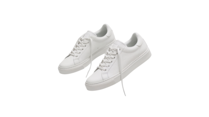 Pair of new white leather sneakers with untied shoelaces floating in the air. Isolated on transparent background, png