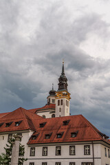 Naklejka premium A belltower on a church in the center of Lubljana, Slovenia