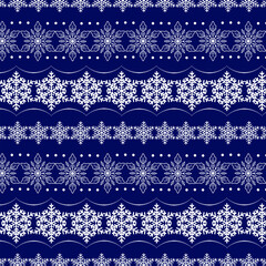 A magnificent ornament of openwork snowflakes.Vector seamless pattern with beautiful white snowflakes on a blue background.