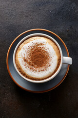 Elegant cappuccino served in glass cup promoting educational curiosity about coffee preparation and inspiring cultural sustainability through culinary art
