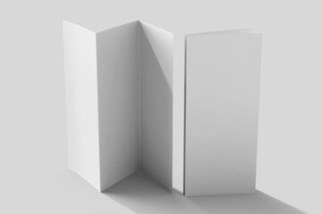 Naklejka premium blank paper trifold brochure spread and folded standing view realistic mockup template showcase isolated