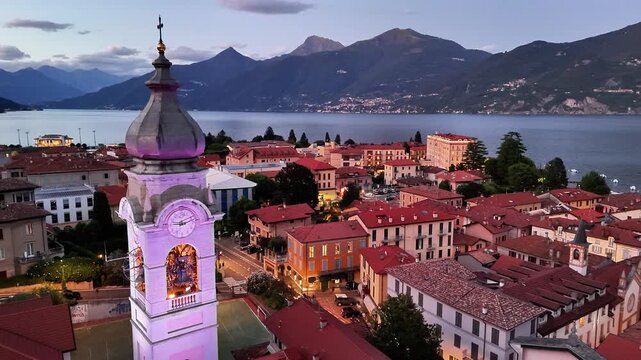Stunning sunset over Menaggio on Lake Como showcases beautiful architecture and serene mountains