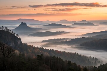 Bastei bridge area in saxon switzerland with fog in the valley at sunrise