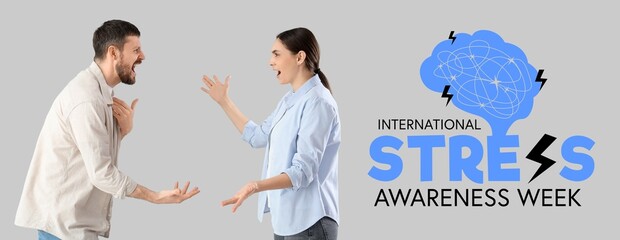 Angry young couple quarreling on grey background. International Stress Awareness Week